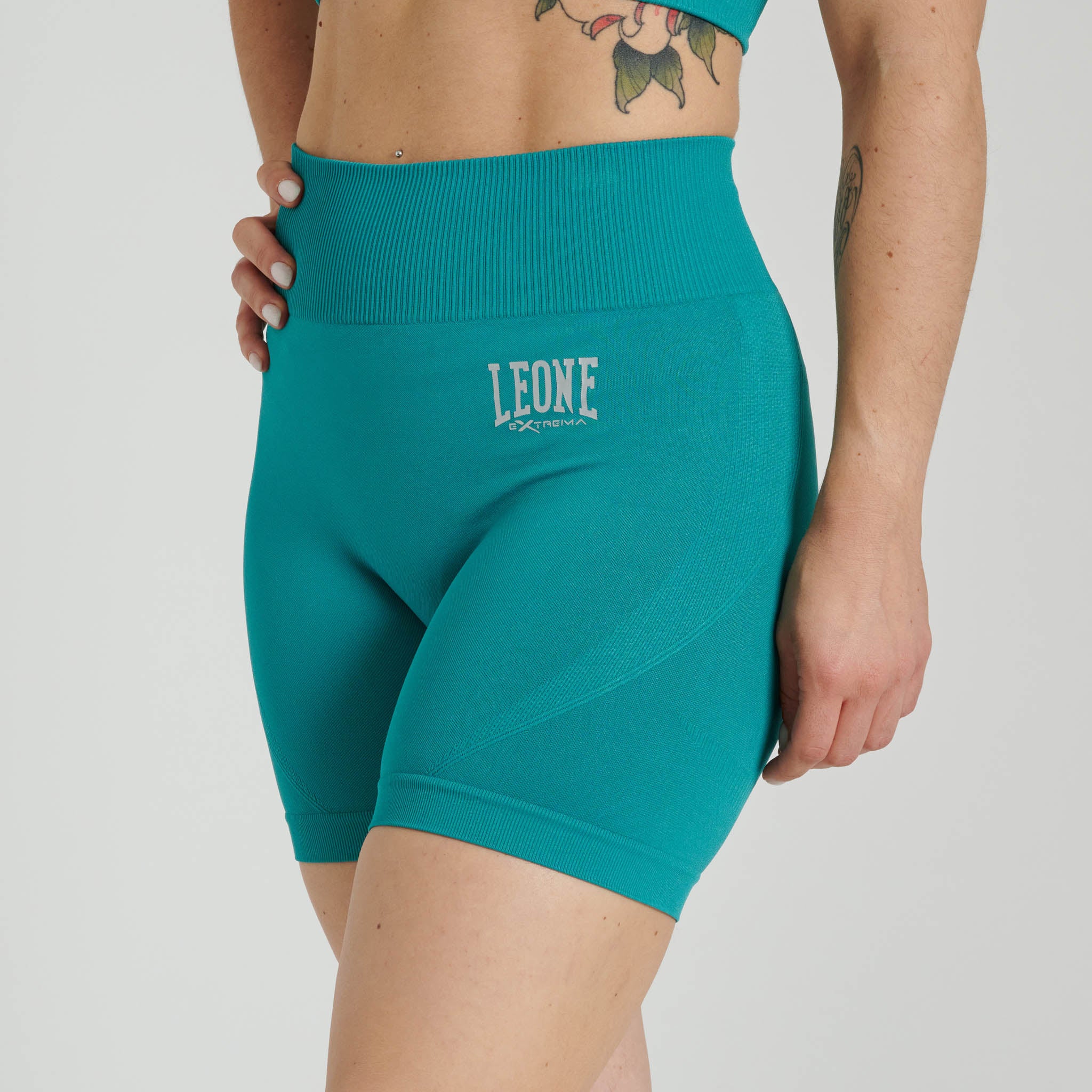 Short compresivo mujer LOGO verde acqua